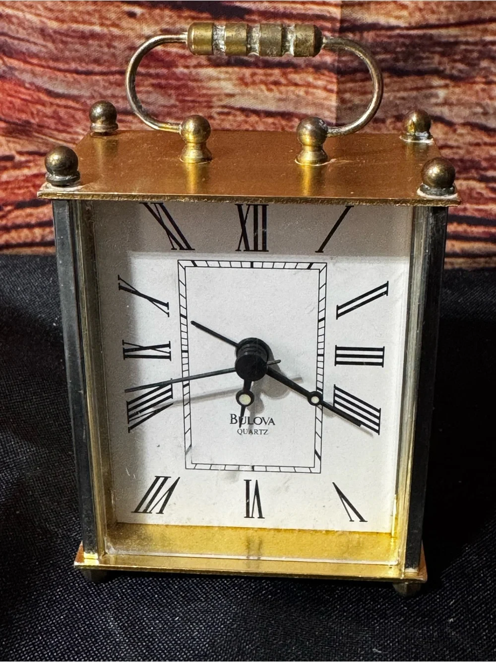 Bulova Gold Color ( I think it is Brass)Carriage Clock with White Roman Dial